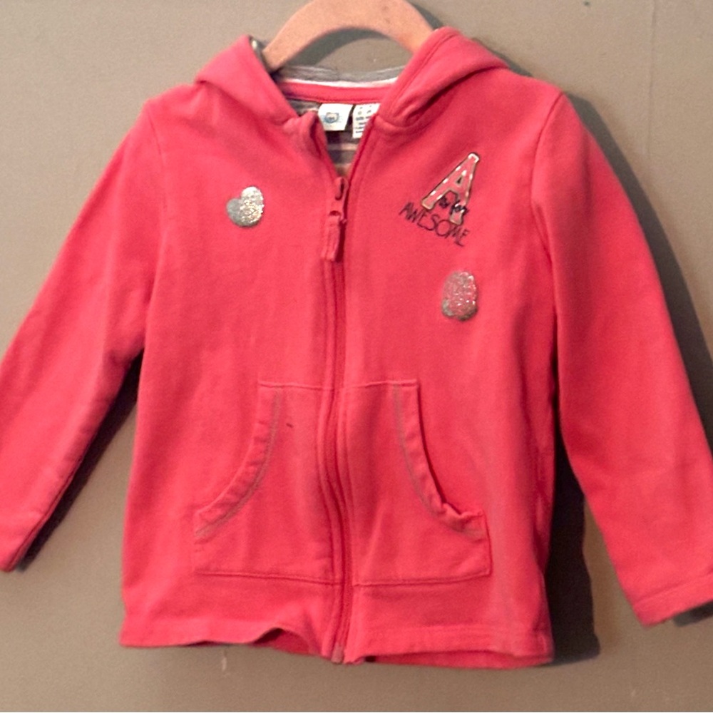 Kids' Cozy Pink Hoodie with Fun Design has a Heart and Rose Design